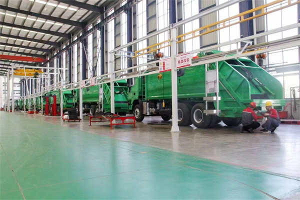 Garbage compactor truck factory